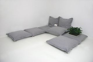 Illustration for article titled ZipZip Floor Cushions Zip Together For Sofa Fun